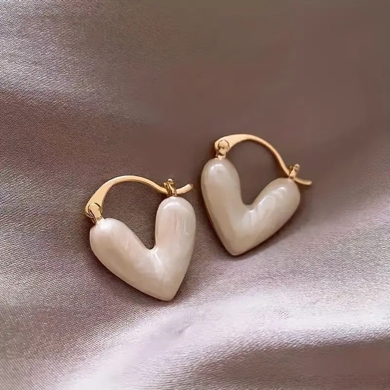 Cute heart earrings huggies in mother-of-pearl Success