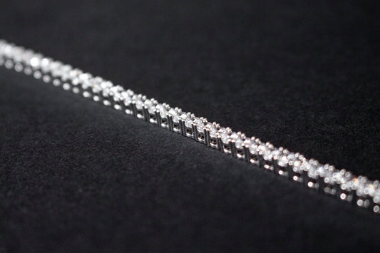 A Grand Slam of Elegance: The Enchanting Tale Behind the Tennis Bracelet - Canvas & Charms