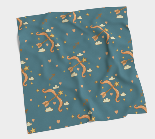 Teal fabric with archery pattern on a light gray background