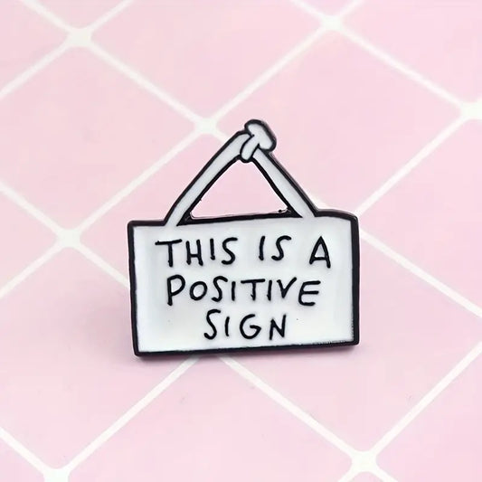 Positive sign enamel pin