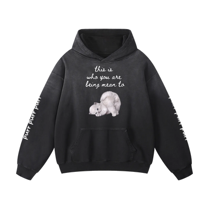 Black hoodie with a graphic of a bear and text on a white background
