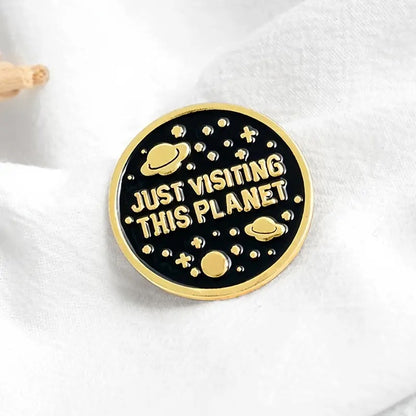 Just visiting this planet enamel pin