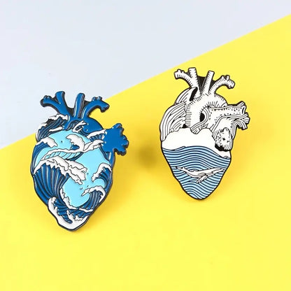 Heart art enamel pin with ocean details Success