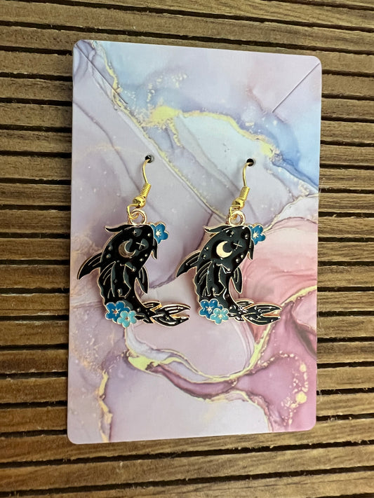 Enamel celestial earrings with whale and lunar design