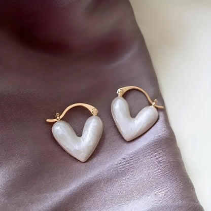 Cute heart earrings huggies in mother-of-pearl Success