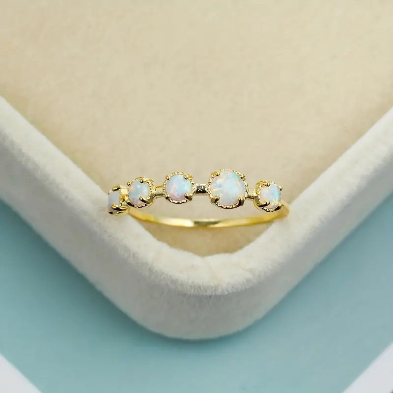 Opal golden ring with 5 stones